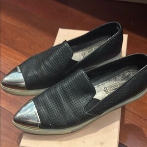 Miu Miu Black Slip-On Shoes with Silver Accents